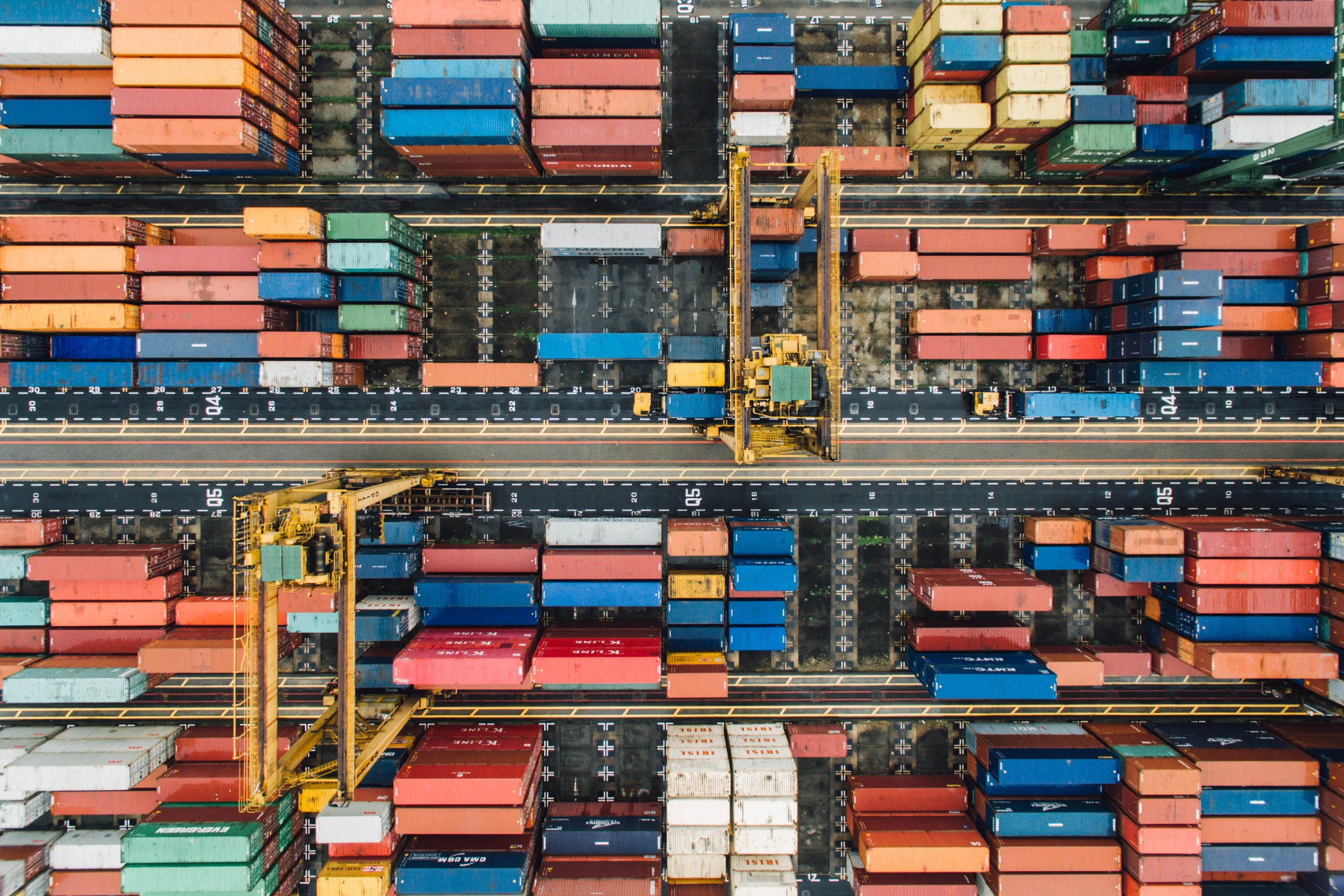 Colourful shipping containers arranged in a Singapore terminal
